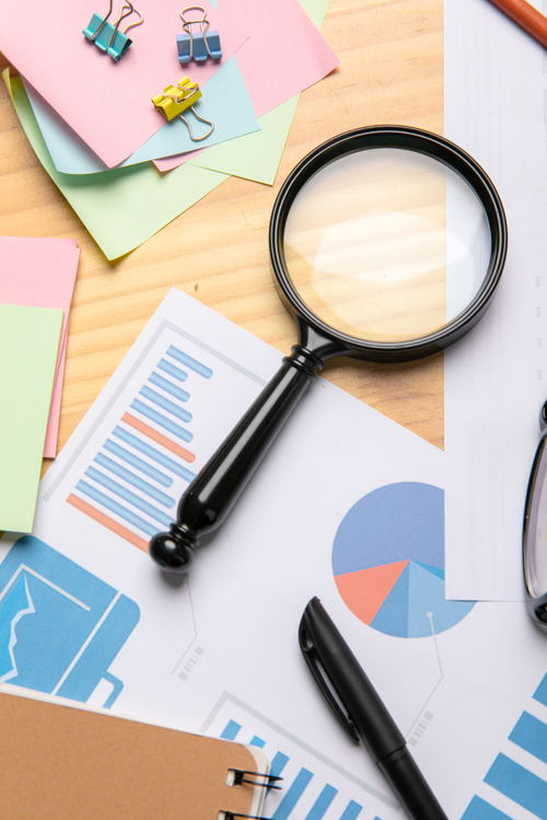 放大鏡數據報表辦公用品商務攝影圖 攝影